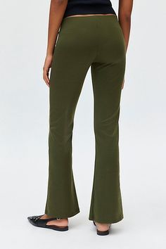 So classic Silence + Noise pant in a pull-on, flare silhouette. Designed in a soft & stretchy knit featuring a mid-rise waistline that hits at the natural waist, tailored seams down the leg and kick-flare hem. Find them only at Urban Outfitters. Features Silence + Noise Bella pull-on knit flare pant Mid-rise trouser Soft and stretchy knit Mid-rise waistline Slim fit through waist and seat Tailored seams down the leg Flare fit Full length Easy pull-on style UO exclusive Content + Care 82% Polyest Non-stretch Flared Hem Bottoms For Fall, Casual Stretch Bottoms With Flared Hem, Solid Flare Bottoms With Elastic Waistband, Casual Stretch Pants With Flared Hem, Stretch Solid Color Bottoms For Fall, Casual Flare Bottoms In Solid Color, Casual Flare Bottoms With High Stretch, Casual Flare High Stretch Bottoms, Non-stretch Flared Hem Pants