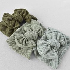 "This soft and cozy waffle textured knit headband is the perfect accessory for your brand new baby girl.  **STYLE Our classic top knot style will never go out of style and looks great with any outfit! This headband is not sewn or glued at the knot, and it can be retied and/or adjusted as necessary. Please see our IG for a tutorial on how to retie (@harperandremi). **FABRIC Our waffle knit fabric is light to medium weight, ultra-stretchy, and is perfect for wearing year-round. **SIZING & FIT Newborn/0-3mo (13\"-16\") Baby/Toddler (16\"-19\") Sizing information above refers to your baby's head circumference. The wide cut band makes it comfortable to wear and helps from slipping off. Bands are approximately 3.25\" wide. **CARE INSTRUCTIONS Harper + Remi headbands should be spot cleaned or han Newborn Bows Headband, Baby Girl Style, Baby Ferrets, Western Nursery, Rose Clothing, Newborn Bows, Green Sage, Knit Headband, Top Knot Headbands