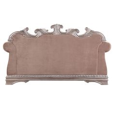 an ornate headboard with silver trimmings on the top and bottom, against a white background