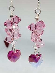 Handmade pink Swarovski crystal drop earrings. Sterling silver fish hook ear wire. Pink Crystal Dangle Earrings With Ear Wire, Pink Dangle Crystal Earrings With Sparkling Stones, Pink Dangle Crystal Earrings For Valentine's Day, Handmade Pink Crystal Drop Earrings, Pink Metal Dangle Crystal Earrings, Swarovski Jewelry Earrings, Swarovski Crystal Drop Earrings, Diy Jewelry Unique, Pink Swarovski