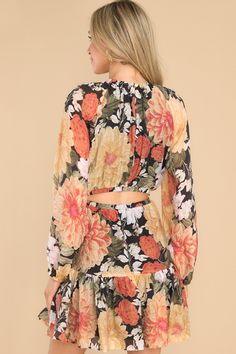 Make heads turn with our Clementine Mini Dress! Boasting a colorful floral print and long sleeve silhouette. this mini classic will have you feeling fun and flirty with every twirl! (And trust us. there will be lots of twirling). This dress features a round neckline. a keyhole cutout at the back of the neck with a functional button closure. long sleeves with elastic cuffs. a cutout at the back of the waist. an elastic waistband. and a flowy skirt. • 80% Viscose. 20% Polyamide • Hand Wash Cold • Lined 100% Viscose • Imported Sorority Rush Dresses, Sleeve Silhouette, Brunch Dress, Rush Dresses, Mini Classic, Cardigan Crop Top, Red Dress Boutique, Dress Bra, Little White Dresses