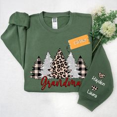 Christmas Trees With Lights Grandma Shirt, Christmas Sweatshirt, Glitter Sweatshirt Please double-check your options before purchasing. This sweatshirt is a stylish and eye-catching fashion item. Its main material is soft cotton fabric, providing a comfortable and warm feel when worn. The sweatshirt features some glitter patterns embellished on the surface, creating vibrant and unique accents. The glitter patterns are made of small light-reflecting particles, resulting in a sparkling and shiny e Christmas Festive Cotton Sweatshirt, Christmas Green Graphic Print Sweatshirt, Festive Christmas Crew Neck Sweatshirt, Womens Merry Christmas Tree Sweatshirt Chicmiky, Womens Merry Christmas Tree Sweatshirt, V Neck Shirts, Plaid Christmas Tree, Womens Christmas Shirts, Merry Christmas Everyone