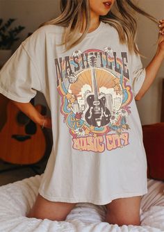 "Nashville Tee, Nashville T-shirt, Music City, Tennessee Tee, Vintage Inspired T-shirt, Unisex Tee, Comfort Colors T-shirt ✧ WHY YOU'LL LOVE IT ✧ ⋒ Comfort Colors® tees are garment-dyed shirts that are timeless classics and will never pile. ⋒ Trendy retro vintage look and gorgeous colors. ⋒ Amazingly soft and comfy. Perfect with any shorts, skirts, jeans, leggings, or nothing but undies around the house. ⋒ Created with quality in mind, it's made from 100% ring-spun cotton. ⋒ Will last for years Nashville Shirts, Nashville Country Music, Bliss Products, Nashville Country, Tennessee Shirt, Trip Outfit, Country Music Shirt, Humanitarian Aid, Looks Country