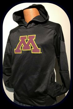 Collegiate Moisture-wicking Hooded Hoodie, Team Logo Hoodie For Fall In Fan Apparel Style, Team Logo Hoodie For Fall Fan Apparel, Team Logo Hoodie For Fall, Moisture-wicking Hoodie For Fan Gear, Collegiate Black Hoodie With Team Logo, Collegiate Black Sweatshirt With Drawstring Hood, Black Hoodie For Fan Gear In Winter, Black Hoodie Crew Neck For Fan Gear