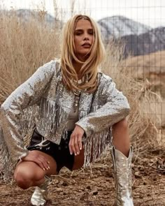 This cropped fringe jacket with silver sequins is for the country diva in all of us. If you're looking to stand out and ensure nobody else has your vibe, then the Star Crossed is for you Description for Boots: https://www.etsy.com/ca/shop/RoseShopbyEve?ref=shop_sugg§ion_id=39182776 - silver fringe sequin jacket - fringe detail on the bust and sleeves - front snap button closure - cropped fit - lined - 100% polyester - hand wash cold - do not bleach, hang flat to dry, iron low Bachelorette Party Disco, Cowgirl Jacket, Disco Outfits, Outfit Cowgirl, Cowgirl Bachelorette Parties, Tassel Jacket, Cowgirl Bachelorette, Denim And Diamonds, Nashville Bachelorette