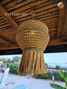 a chandelier hanging from the ceiling in front of a wooden structure with text overlay that reads pattern no 3