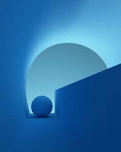 a ball sitting in the middle of a blue room with sunlight coming through it's walls