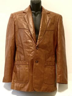 This is one cool jacket.... It looks like something that you would have seen on Starsky and Hutch!  It is in amazing condition and would make a great edition to anyone's collection, or would be great for a movie prop. Measures 18" from armpit to armpit buttoned Vintage Formal Fitted Leather Jacket, Vintage Fitted Leather Jacket For Formal Occasions, Vintage Leather Business Jacket, Vintage Leather Jacket For Business, Vintage Leather Fitted Blazer, Vintage Brown Leather Jacket For Formal Occasions, Vintage Leather Jacket With Buttons For Business, Vintage Leather Blazer With Button Closure, Vintage Leather Blazer For Business