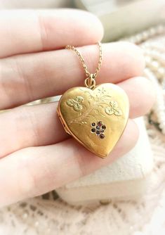 "Beautiful Big 18k Solid Gold French Antique c1900s Victorian Heart Vine Grapes Engraved Locket Photo Holder Pendant, Gift for Woman Size: Total length with hanging circles - approx. 32,5mm / 1,28\" Heart itself - approx. 24,5x24mm / 0,96 x 0,95\" Width - approx. 4,5mm / 0,17\" Weight - 2,89g (without a photo inside) Pendant is in a great antique condition, very high quality, shiny and with beautiful engravings. Made of 18k solid yellow gold ( marked with eagles's head ) and and rubies. Has so collectible and lovely vine motif, grapes made of shiny natural ruby stones and vine leaves are made in green tone gold. It has some delicate signs of age, little dents on the surface at the back, also some little scratches, as you can see on photos, but it only shows that pendant was loved and it st Luxury Engraved Heart Necklace, Luxury Yellow Gold Locket Necklace For Valentine's Day, Luxury Victorian Heart-shaped Necklace, Luxury Yellow Gold Locket Necklace With Heart Charm, Luxury Romantic Locket Necklace, Luxury Heart Pendant Locket Necklace With Heart Charm, Luxury Locket Necklace With Heart Charm For Wedding, Luxury Heirloom Heart Pendant Necklace, Luxury Antique Locket Necklace For Anniversary