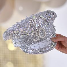 Make the birthday girl feel incredible with this 30th birthday hat! This embellished hat is a must-have accessory to make the birthday girl look extra special. Our new gold party collection is all about the glitz and glamour. This lavish range is for those big celebrations with disco balls, impressive backdrops and milestone hats! Each pack contains 1 x 30th birthday hat measuring 28cm (H) x 30cm (W). 30th Ideas, Daisy Headband, 30th Birthday Decorations, Christmas Paper Plates, Ginger Ray, Garland Backdrops, Halloween Tableware, Glitz And Glamour, Rose Gold Party