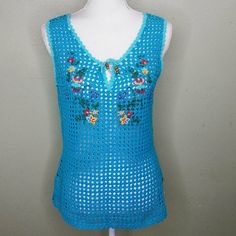 Wear This Over A Tank Or Cami In Warm Weather, And Then Over A Long-Sleeved Top When It Turns Cool! From Armpit To Armpit It Measures Approx. 19" And About 25" From Shoulder To Hem. Has Store Tag Only. Light Blue V-neck Top For Beach Season, Turquoise Cotton Beach Tops, Fitted Bohemian Turquoise Tops, Fitted Turquoise Bohemian Tops, Bohemian Turquoise Tops For Summer, Embroidered Crochet Top For Spring Beach, Embroidered Crochet Top For The Beach, Embroidered Crochet Top For Beach, Blue Cotton Crochet Top For Festival