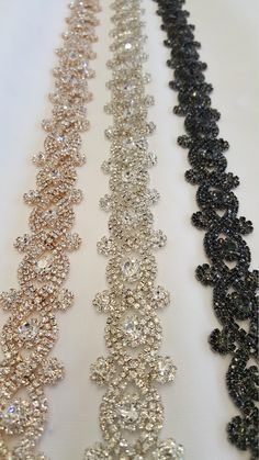 This beautiful trim is made of high-quality clear rhinestones. It is perfect for all special occasions. It can be used for wedding dress, wedding belts and sashes, bridesmaid sashes and belts hats, headbands, headpieces, flower bouquet wrap, wedding invitation, gowns, hair accessory, sash craft, jewelry, cake decoration, bags, scrapbook or any other decorations. Applying Method: Sew on, Glue on Color: rose gold black diamond -------------------- Gold Size: Width: 1 Inches Length: 1 Yard Please c Elegant Embellished Crystal Bridal Belt, Elegant Embellished Crystal Rhinestone Necklace, Elegant Crystal Embellished Rhinestone Necklace, Elegant Embellished Rhinestone Necklace For Wedding, Crystal Rhinestone Jewelry For Prom, Crystal Bridal Belt For Party, Silver Embellished Bridal Belt For Evening, Formal Silver Crystal Bridal Belt, Elegant Embellished Bridal Belt For Party