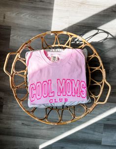 This listing is for ONE "Cool Moms Club" t-shirt you're going to look really pretty in this shirt  we are loving the monochromatic color scheme!  available on regular length tshirt or long crop tshirt 👇 DETAILS Comfort Colors 1717 ☺︎ 6.1-ounce, 100% ring spun cotton     Soft-washed, garment-dyed fabric     Double-needle collar     Twill-taped neck and shoulders     Twill label     Double-needle armhole, sleeve and bottom hems ☺︎ Premium Vinyl Comfort Colors 3023CL ☺︎ 6.1-ounce, 100% ring spun c Pink Slogan T-shirt For Loungewear, Cool Crew Neck Tops With Text Print, Cotton Slogan Top For Fan Apparel, Cotton Slogan Tops As Fan Apparel, Cotton Slogan Tops For Fans, Cotton Fan Apparel Tops With Slogan, Cotton Tops With Text Print, Pink T-shirt With Text Print For Loungewear, Cotton Slogan Tops For Fan Merchandise