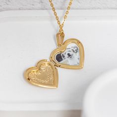 Heart locket necklace is the perfect gift for anyone who wants to keep their loved ones close to their heart. It features a heart-shaped locket that can hold a photo or memento of a loved one, allowing you to keep them close to your heart. It's a great gift for any occasion, like birthdays or Valentine's Day, and can even be personalized by engraving it. Heart Locket Necklace is a must-have addition to any jewelry collection, thanks to its exquisite design and sentimental value.  💬 Please send us your image via direct messages. 📣 Additional information about the product 👉 Material: Stainless steel 👉 Finish: Silver, Gold 🎁 Comes with a gift box Double Heart Locket Charm Necklace For Keepsake, Keepsake Double Heart Locket Charm Necklace, Heart Pendant Locket Charm Necklace For Keepsake, Heart Charm Locket Necklace As Keepsake, Heart Charm Locket Necklace For Keepsake, Keepsake Heart Charm Locket Necklace With Round Pendant, Keepsake Locket Necklace With Heart Charm, Heart Charm Pendant Locket Necklace As Keepsake, Keepsake Heart Charm Locket Necklace