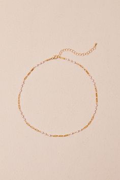 Whether you add it to your stack or style it solo, you'll shine with the Lulus Dainty Composure Gold Pearl Station Chain Necklace! Shiny, gold-toned metal shapes this sweet necklace that has elongated links and a super slender profile, with various groupings of glowing faux pearl beads along its length. Lobster clasp closure. 19" Long With A 3" Extender Chain. Man Made Materials. Made In China. Imported. Lulus | Dainty Composure Gold Pearl Station Chain Necklace. Gold Pearl Choker With Clavicle Chain, Gold Pearl Clavicle Chain Choker, Trendy Gold Pearl Necklace With Beaded Chain, Gold Choker Necklace With Pearl Chain, Gold Beaded Chain Pearl Choker, Trendy Gold Pearl Necklace With Chain, Delicate Metal Chain Necklace With Adjustable Chain, Trendy Gold Charm Necklace With Pearl Chain, Dainty Gold-tone Clavicle Chain Necklace