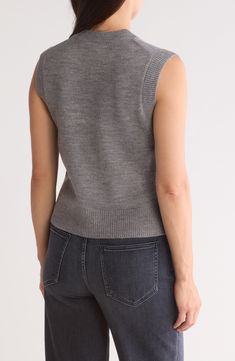 With a high crewneck and muscle-tee styling, this is a sweater-vest that's versatile enough to be layered over or under anything. 21" length (size Medium) Crewneck Sleeveless 94% acrylic, 5% nylon, 1% elastane Dry clean or hand wash, dry flat Imported Stretch Tank Top For Fall Layering, Relaxed Fit Sweater Vest For Fall Layering, Fall Workwear Sweater Vest With Crew Neck, Fall Cotton Crew Neck Sweater Vest, Fall Crew Neck Sweater Vest For Work, Fall Cotton Stretch Sweater Vest, Versatile Tank Top For Fall Layering, Fall Crew Neck Vest, Cotton Sweater Vest For Workwear With Crew Neck