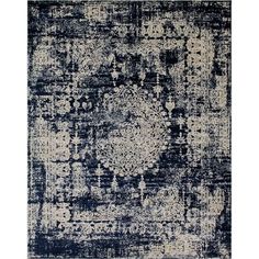 a blue and white rug with an abstract design on the bottom, it is shown