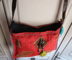 "Vintage Ethnic Shoulder Bag! In Mint condition!! This bag is made by fabric and leather materials. Zipper Working. Lining Black cotton! Measures: 12.6\" x 9.44\" (32 cm x 24 cm) Strap: 44.88\" (114 cm) Thanks for stopping by!!" Red Leather Handle Pouch Shoulder Bag, Red Leather Festival Bag, Traditional Red Bags With Leather Handles, Handmade Red Hobo Bag For Travel, Red Bohemian Leather Satchel, Red Leather Bohemian Satchel, Bohemian Red Leather Satchel, Red Bohemian Pouch Shoulder Bag, Bohemian Red Leather Shoulder Bag