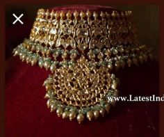 This opulent choker set is fit for a bride and even her close ones attending the wedding. This choker is a perfect amalgam of timeless style and drama that draws in attention. Necklace Closure - Adjustable Dori Earrings Closure - Push Back Style Tip - When it comes to getting a classic look, nothing can be better than kundan. This necklace set is fit for a woman who is fiercely independent yet rooted in traditional and cultural heritage, carving her own style with classic and timeless fashion ch Hand Set Choker For Reception And Festivals, Hand Set Choker For Receptions And Festivals, Hand-set Choker For Receptions And Festivals, Heavy Choker For Festivals And Reception, Bollywood Style Tilla Choker For Weddings, Heavy Choker For Reception And Festivals, Wedding Choker With Cutdana For Festivals, Bollywood Heavy Choker For Wedding, Heavy Choker For Wedding And Diwali