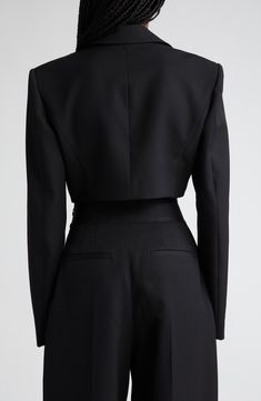 An abbreviated length balances the trend-savvy strong-shoulder silhouette of this tuxedo-inspired blazer tailored from wool twill. 15 1/2" length (size 2) Open front Notched lapels Chest welt pocket Lined 100% wool Dry clean Imported Designer Clothing Suits For Bride, Black Wedding Suits, Wedding Suits For Bride, Tailored Fashion, Tuxedo Women, Strong Shoulders, Tuxedo Blazer, Tuxedo Jacket, Fashion 2024