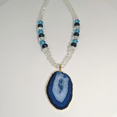 Blue Is A Calming And Reflective Color. The Agate Has A Supportive Energy That Can Symbolize Freedom And Serenity. Blue Agate Helps To Explore Polarities In Your Own Self. The Blue Agate Gemstone Is Said To Have Healing Properties, Making It Not Only A Beautiful Piece Of Jewelry But Also A Meaningful One. The Seller Warranty Provides Peace Of Mind. This Necklace Is Perfect For Beauty And Fashion Enthusiasts, And It Makes A Great Gift For Friends And Family. Adjustable Blue Crystal Necklace With Natural Stones, Blue Agate Stone Necklaces, Blue Beaded Necklaces With Stones For Healing, Adjustable Blue Beaded Necklaces With Stones, Blue Spiritual Crystal Necklace With Faceted Beads, Blue Agate Beaded Necklace With Natural Stones, Blue Agate Beaded Necklaces With Natural Stones, Blue Agate Crystal Necklace For Gift, Blue Agate Stone Necklace