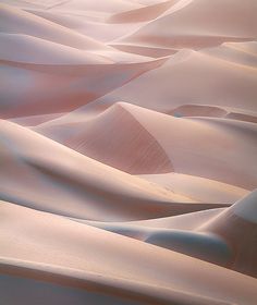 the desert is covered in sand dunes