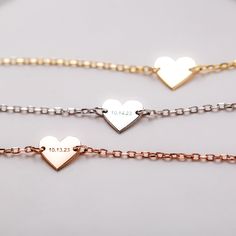 Engraved Heart-Shaped Bracelet - A Custom Tale of Love & Memories Personalize your bracelet by adding your initials, name, or a special date. Crafted with care, this heart-shaped bracelet is the perfect way to express your love and affection. Wear it as a reminder of a special moment or person in your life. WHAT MAKES IT SPECIAL A cute heart shape that speaks volumes. Sturdy and pretty at the same time. Personalize it with dates, initials, or symbols that are meaningful to you. Our expert team e Personalized Heart Pendant Bracelets For Anniversary, Personalized Heart Bracelet With Name, Heart-shaped Name Bracelet For Gift, Personalized Heart Name Bracelet For Gift, Heart-shaped Name Bracelet Gift, Personalized Name Heart Bracelet, Personalized Adjustable Heart Pendant Bracelets, Personalized Heart Charm Bracelet For Friendship, Customized Heart-shaped Name Bracelet As Personalized Gift