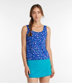 The best value under the sun, our full-coverage scoopneck tankini swim top stays strong and looks great in premium Italian swim fabric. It's breathable, quick-drying, chlorine-resistant and proof you can find a great swimsuit at a great price. Falls at hip Fitted Front length from shoulder: Regular 23. 5", Plus 25. 25", Long 25" Liner Content: 95% polyester, 5% spandex Body Content: 80% nylon, 20% Lycra® Xtra Life Handwash, line dry. Quick Dry: Yes Sun Protection: Yes, UPF 50+ rated fabric block Sporty Tankini For Spring Vacation, Sporty Spring Vacation Tankini, Fitted Moisture-wicking Tops For Summer, Sporty Spring Tankini For Poolside, Summer Sports Printed Tops, Spring Beach Tops With Moisture-wicking, Sporty Stretch Tankini For Summer, Fitted Tankini With Built-in Bra And Scoop Neck, Summer Sports Tops With Prints