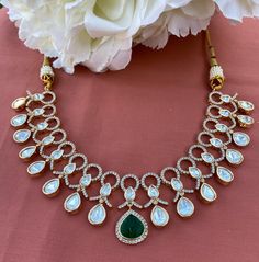 Exquisite tyaani inspired uncut polki necklace set. #statementjewelry #fashion #trendy #weddingseason #jewelry #weddingjewelry #fashionjewelry #kundanjewelry #punjabiwedding #indianwedding #diljitdosanjh #punjabijewelry #india #pakistan #canada #vancouver #toronto #brampton #usa #california #bayarea #sanfrancisco #texas #dallas #houston #newyork #chicago #sanantonio #florida #gehnagalleryusa Designer Kundan Jewelry With Gota Work, Kundan Jewelry With Gota Work For Designer Wear, Festival Designer Kundan Necklace With Stone Work, Designer Kundan Chandbali Necklace, Festive Kundan Bridal Necklace With Cut Dana, Designer Kundan Bridal Necklace With Intricate Design, Designer Chandbali Kundan Necklace With Cutdana, Reception Kundan Temple Necklace With Stone Work, Elegant Kundan Necklace With Mirror Work