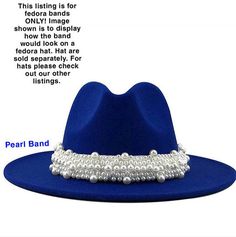 Pearl Band for fedora or other hats. Easy to quickly change for a different look with the same hat. (Hat not included) Images shown are to display how the bands would look on a fedora hat. Hats are sold separately. Adjustable Short Brim Fedora For Parties, Adjustable Brimmed Fedora For Parties, Adjustable Flat Crown Fedora For Party, Party Fedora With Adjustable Flat Crown, Trendy Adjustable Costume Hats With Short Brim, Adjustable Blue Fedora For Parties, Elegant Blue Fedora Hat, Blue Wide-brim Fedora For Country Events, Blue Wide Brim Fedora