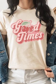 The "Retro Good Times Cherry Fruit" graphic T-shirts encapsulate a nostalgic vibe with their vibrant design showcasing cherries, symbolizing joy and sweetness reminiscent of a bygone era. These T-shirts not only offer a stylish throwback to retro aesthetics but also provide wearers with a fashionable and comfortable piece for casual occasions. With their lively graphics and retro charm, these shirts become a fun and expressive way to celebrate the good times in a timeless and playful fashion.Mad Trendy Crew Neck T-shirt With Cherry Print, Retro Summer T-shirt With Slogan, Vintage Slogan Tops For Spring, Retro Slogan Tops, Vintage Text Print T-shirt For Spring, Red Retro Slogan Tops, Retro Red Tops With Slogan, Retro Pink Top With Retro Print, Trendy Summer T-shirt With Retro Print