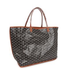 This Goyard Anjou GM tote bag is in Black Goyardine canvas with palladium hardware, contrast stitching, tan Chevroches calfskin lining, and a detachable black coin purse.This bag is reversible.Origin: FranceCondition: New and never worn (plastic on handles)Accompanied by: Goyard dustbag, retail UPC, removable pouchMeasurements: 15" x 13.4" x 7.8" 7.5" shoulder strap Monogram Canvas Shoulder Bag With Leather Handles For Errands, Top Handle Bag In Monogram Canvas With Palladium Hardware, Top Handle Bag With Palladium Hardware On Monogram Canvas, Monogram Canvas Bag With Palladium Hardware Top Handle, Brown Coated Canvas Shoulder Bag With Palladium Hardware, Everyday Bags With Leather Handles And Monogram Canvas, Everyday Monogram Canvas Bag With Leather Handles, Black Large Capacity Monogram Canvas Bag, Brown Monogram Canvas Bag With Palladium Hardware