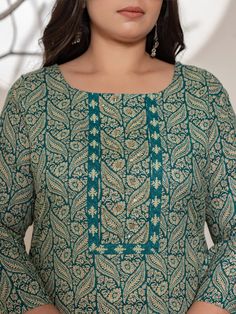 This 3-piece set includes teal green cotton ethnic motif print, beads & stone detailing straight shape kurta has round neck, 3/4th sleeves, straight hem, calf length teamed with printed trouser pants has elasticated waistband & slip on closure with single pocket and a voile dupatta. The model wearing the size small is 5'8 in height. 3 Piece Set Color-Teal Green Kurta Fabric- Cotton Bottom Fabric - Cotton Dupatta Fabric-Voile Work - Ethnic Motif Print, Beads & Stone detailing Neck - Round Neck Sl Turquoise Straight Kurta For Diwali, Green Salwar Kameez With Printed Motifs, Festive Turquoise Straight Kurta Set, Turquoise Straight Kurta Set For Festive Occasions, Green Bohemian Cotton Anarkali Set, Bohemian Green Cotton Anarkali Set, Turquoise Bollywood Straight Kurta Set, Festive Turquoise Kurta Set, Bollywood Style Turquoise Straight Kurta Set