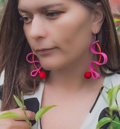 Statement pink and red dangle earrings are colorful and lightweight. Best choice for summer! MATERIALS: Rubber, resin, stainless steel. MEASUREMENTS: Earring`s length: 10.3 cm or 4", width 3.5 cm or 1, 37". One earring`s weight: 8 gr or 0,28 oz HOW TO CARE: Keep jewelry in individual zip lock bags. Avoid mechanical impact with other objects. PACKAGE: All jewelry are sent in PVC storage bag with branded sticker. After receiving jewelry by MKFJ your review is really welcome! Don't hesitate to cont Pink And Red Earrings, Playful Red Earrings For Pierced Ears, Playful Red Dangle Jewelry, Playful Red Drop Earrings, Playful Red Pierced Earrings, Whimsical Red Jewelry With Matching Earrings, Whimsical Red Drop Earrings, Unique Red Earrings For Party, Whimsical Red Dangle Jewelry