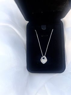 "This handmade breastmilk necklace is a truly unique and special piece of jewelry. Made with your own breastmilk, ( or formula), it is a beautiful reminder of the incredible bond between a mother and her child. The breastmilk is carefully preserved and encapsulated in resin, creating a stunning focal point for the ring. The setting is made of high-quality, durable materials, ensuring that this ring will last for years to come. Whether worn for special occasions or as an everyday accessory, this breastmilk ring is sure to become a treasured keepsake. Each one is custom-made to order, making it a truly personalized and meaningful gift for any mother. Please allow up to a month to receive your item as I order the ring AFTER you order and make it once it arrives to me. ❤️ If you take a few wee Hypoallergenic Jewelry For Mother's Day Keepsake, Small Minimalist Necklace For Gift, Small Minimalist Necklace Perfect For Gifts, Minimalist Small Necklace Perfect For Gifts, Small Minimalist Necklace As A Gift, Small Hypoallergenic Necklace For Gift, Delicate Keepsake Jewelry For Valentine's Day, Sterling Silver Charm Necklace For Keepsake, Sterling Silver Keepsake Charm Necklace