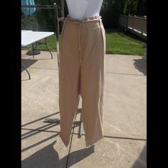 Nwt Badgley Mischka Beige Pants S. Pants Are 55% Linen 45% Viscose. Pants Have A Stretchy Waistband Front Zip Front And Back Pockets. Waist 26" Hip 36" Inseam 31". Retail Is $135. Please Ask Any Questions Before Bidding As All Sales Are Final. Ty And Happy Bidding! Elegant Loungewear Pants With Tie Waist, Elegant Spring Bottoms With Tie Waist, Beige Linen Pants, Striped Linen Pants, Paisley Pants, Floral Print Pants, Wide Leg Palazzo Pants, Beige Pants, Strapless Jumpsuit