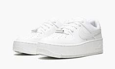 The Women’s Nike Air Force 1 Sage Low “Triple White” is a casual women’s shoe in a colorway based on the model’s iconic “White on White” design.  Made for everyday wear, the Air Force 1 Sage Low features a wedge rubber sole and a leather upper.  Here, on the “Triple White,” the monochromatic white appearance is based on the legendary “White on White” Air Force 1.  White leather can be found on the perforated toe, mid-panel, and on the Swoosh branding that appears on both sides.  The silver lace Womens Air Force 1, Nike Air Force 1 Sage Low, Air Force 1 Sage Low, Custom Sneakers Diy, White Air Force 1, White Air Forces, Nike Air Force Ones, Nike Womens, Nike Fashion