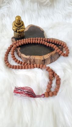 Brand new and authentic 10 mukhi rudraksha mala.  Origin: Indonesia, Bali This 10 face rudraksha protects the wearer from the negative effects of all planets and other negative energies mostly surrounded human. It helps the person to overcome difficult times, problems, hardship and to achieve success in life. This Rudraksha helps the wearer to move in the right direction of life. Brown Mala For Healing And Festivals, Spiritual Brown Mala For Meditation, Brown Spiritual Mala For Meditation, Spiritual Brown Mala For Festivals, Brown Spiritual Mala For Festivals, Brown Hand Knotted Mala For Healing, Hand Knotted Brown Mala For Healing, All Planets, Rudraksha Mala