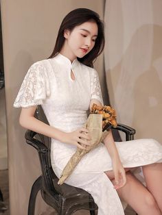 ⭐⭐ Free Shipment to Worldwide! Handmade Lace Gown Dress for Brides. ⭐⭐ This White Dress can be custom size according to your measurement. Please send us your Shoulder Width/ Bust/Waist/Hip/ Dress Length for size customization. And your height; Another Wine Red color option Link to: https://www.etsy.com/listing/1037914242/custom-size-able-china-red-wedding?ref=listings_manager_grid 1. This Cheongsam/ Qipao is made for occasions as : ⭐ Perfect for Brides who wants a Traditional wedding ceremony; 领 White Fitted Lace Dress For Banquet, Fitted White Lace Dress For Ceremony, Fitted Short Sleeve Dresses For Ceremonies, Qipao Modern, Qipao Pattern, Wedding Qipao, Wedding Cheongsam, Red Qipao, Modern Qipao