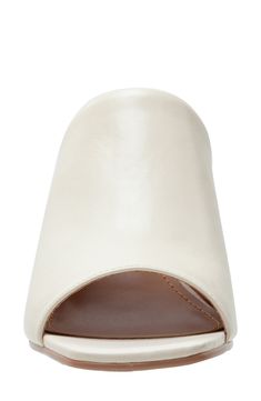 A squared open toe and wrapped block heel frame a versatile mule that will complement your polished wardrobe. 3" heel Cushioned footbed Slip-resistant sole Leather upper/synthetic lining/rubber sole Imported Formal Synthetic Mules With Square Toe, Beige Open Toe Mules With Padded Heel, Beige Open Toe Mules With Stacked Heel, White Block Heel Mules With Removable Insole, Modern Wedge Heel Mules With Padded Heel, White Mules With Reinforced Heel For Spring, Open Toe Synthetic Mules With Padded Heel, Leather Slide Mules With Padded Heel, Classic Slide Mules For Spring