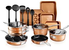 an assortment of pots and pans are shown with utensils in the middle