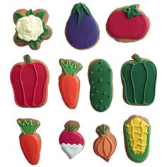 decorated cookies in the shape of fruits and vegetables