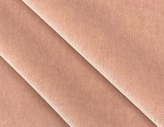 a close up shot of the fabric in light pink color, it is very soft