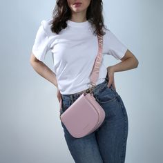 Our Classic Crossbody is simplicity and subtlety in a compact, timeless form. Made from recycable preimume vegan leather, this classic leather shows its wear beautifully over time. An adjustable wide strap and slim silhouette allows for a comfortable and flattering carry, day or night. Size L 7.7 In x W 2.5 In x H 6.3 In. Straps length 34 In-50 In 1 major zipper pocket 2 open compartment Crossover Bag Outfit, Versatile Shoulder Bag With Arcuate Strap, Daily Use Shoulder Bag With Arcuate Strap, Feminine Soft Leather Shoulder Bag, Trendy Leather Shoulder Bag With Adjustable Straps, Crossover Bag, Crossover Bags, Bag Outfit, Pink Sale