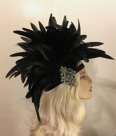 "1920s Flapper, Great Gatsby, Black Gatsby Headpiece, Flapper Headband, Jazz Age, Roaring 20s, Rhinestone Feather Headdress, 1920s, NYE Absolutely stunning headpiece! This is a large dramatic piece, do not wear if you don't want to be the center of attention ; ~) Headbands are handmade, hand stitched, (machine stitched for larger feathers) not held together with only glue so you don't have to worry about it heating up and falling apart. With proper storage they will last for many years. *store f Art Deco Headpiece, Gatsby Headpiece, Flapper Headpiece, Gatsby Headband, 1920s Headpiece, 1920s Hair, Flapper Headband, Large Feathers, Feather Headdress