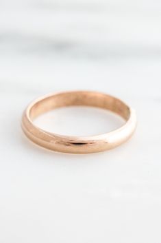 We love our dainty rings, but we also love our bold rings. Our Thick Band Ring may seem simple, but it's thick enough to be a statement piece. It has a nice weight & feel to it, and is also very comfortable because it's rounded on the outside and flat on the inside. Stack it with your favorite rings or wear it by itself - Find more at Simple & Dainty. Timeless Adjustable Ring With Thick Band, Timeless Thick Band Adjustable Ring, Classic Wide Band Promise Ring, Timeless Adjustable Thick Band Ring, Everyday Stackable Wide Band Ring, Stackable Rings With Wide Band For Everyday, Wedding Stackable Rings With Thick Band, Classic Wide Band Ring For Promise, Classic Round Midi Rings For Promise