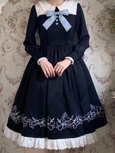 Features: It features a peter pan collar with ruffle-trimmed, long bishop sleeves, heart-shaped embroidery front, elegant dress.  Attention: This price includes the OP only, white apron and others are not included.  Size Chart of OP:   	 		 			Size(cm) 			S 			M 			L 			XL 			XXL 		 		 			Bust 			78-84 			84-88 			88-92 			92-96 			96-100 		 		 			Waist 			58-64 			64-68 			68-72 			72-76 			76-80 		 		 			Dress length 			110 			112 			114 			116 			118 		 		 			Sleeve length 			58 			59 			60 Elegant Long Sleeve Costume Dress, Black Long Sleeve Vintage Costume Dress, Black Vintage Dress For Spring Costume Party, Black Long Sleeve Vintage Dress For Costume, Black Vintage Dress For Costume Party In Spring, Elegant Long Sleeve Victorian Dress For Costume Party, Elegant Long Sleeve Vintage Dress For Costume Party, Vintage Dress With Doll Collar For Spring Party, Spring Vintage Dress With Doll Collar For Parties