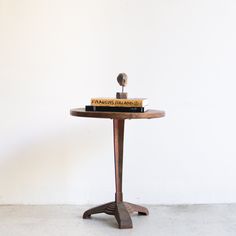 a small table with a book on it