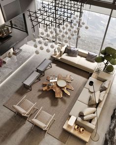 a modern living room with lots of furniture