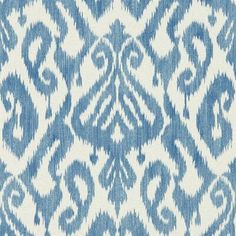 a blue and white pattern on fabric